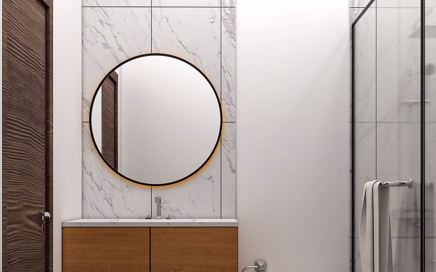 Minimal organic modern bathroom with a wall-mounted wood vanity, round mirror, and stone-look wall