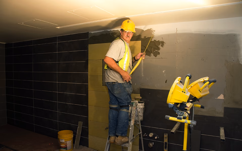 New bathroom area under construction with tile work underway